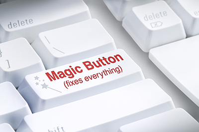 computer keyboard with a button labelled magic button fixes everything
