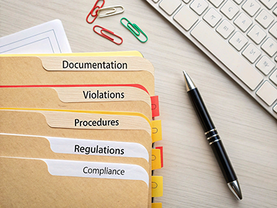 office folders with labels showing different HR policies labels